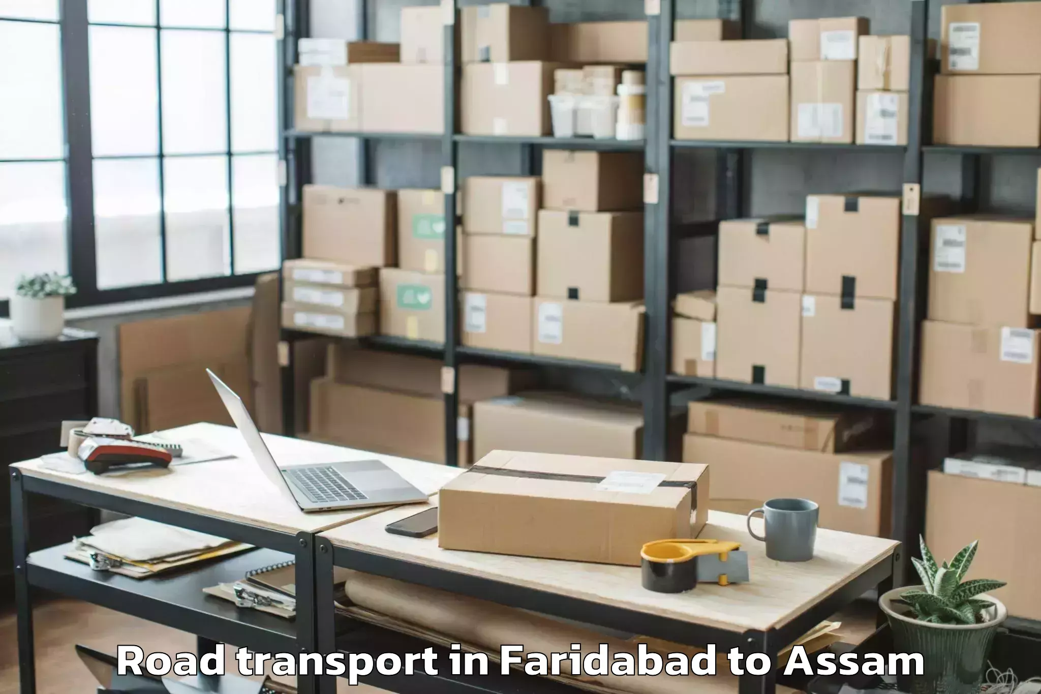 Affordable Faridabad to Kharupatia Road Transport